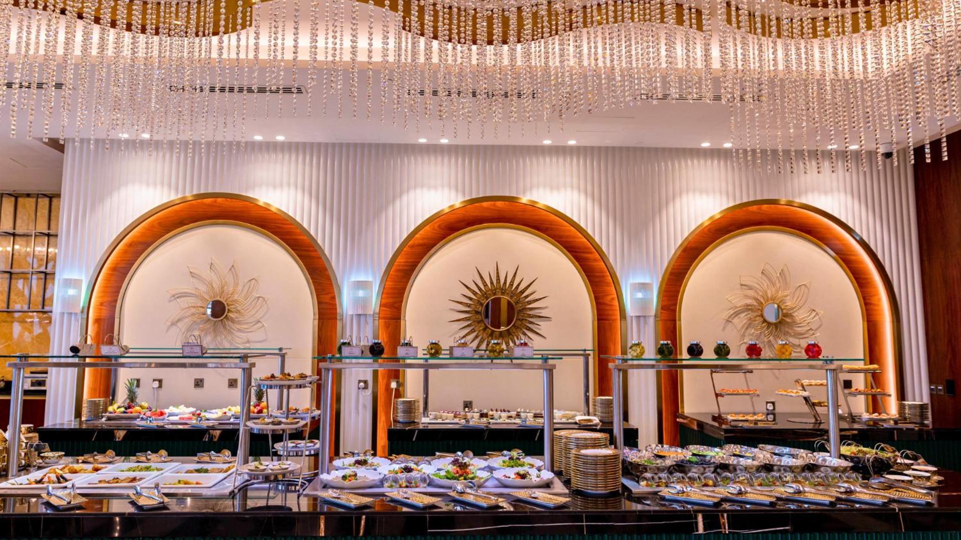 Velero Hotel Doha Lusail Kültér fotó The buffet at the Grand Ballroom