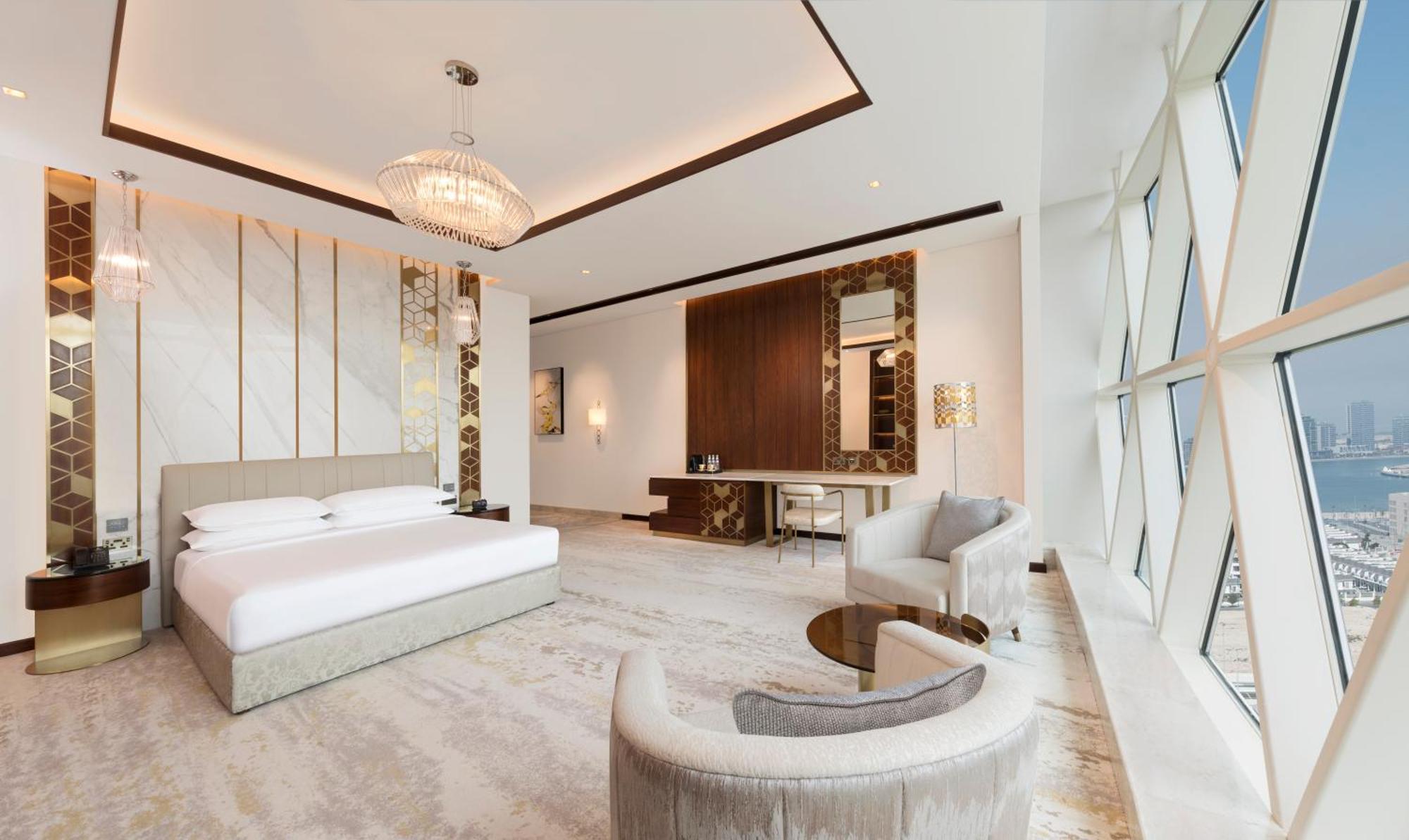Velero Hotel Doha Lusail Kültér fotó A bedroom at the Ritz-Carlton, DIFC