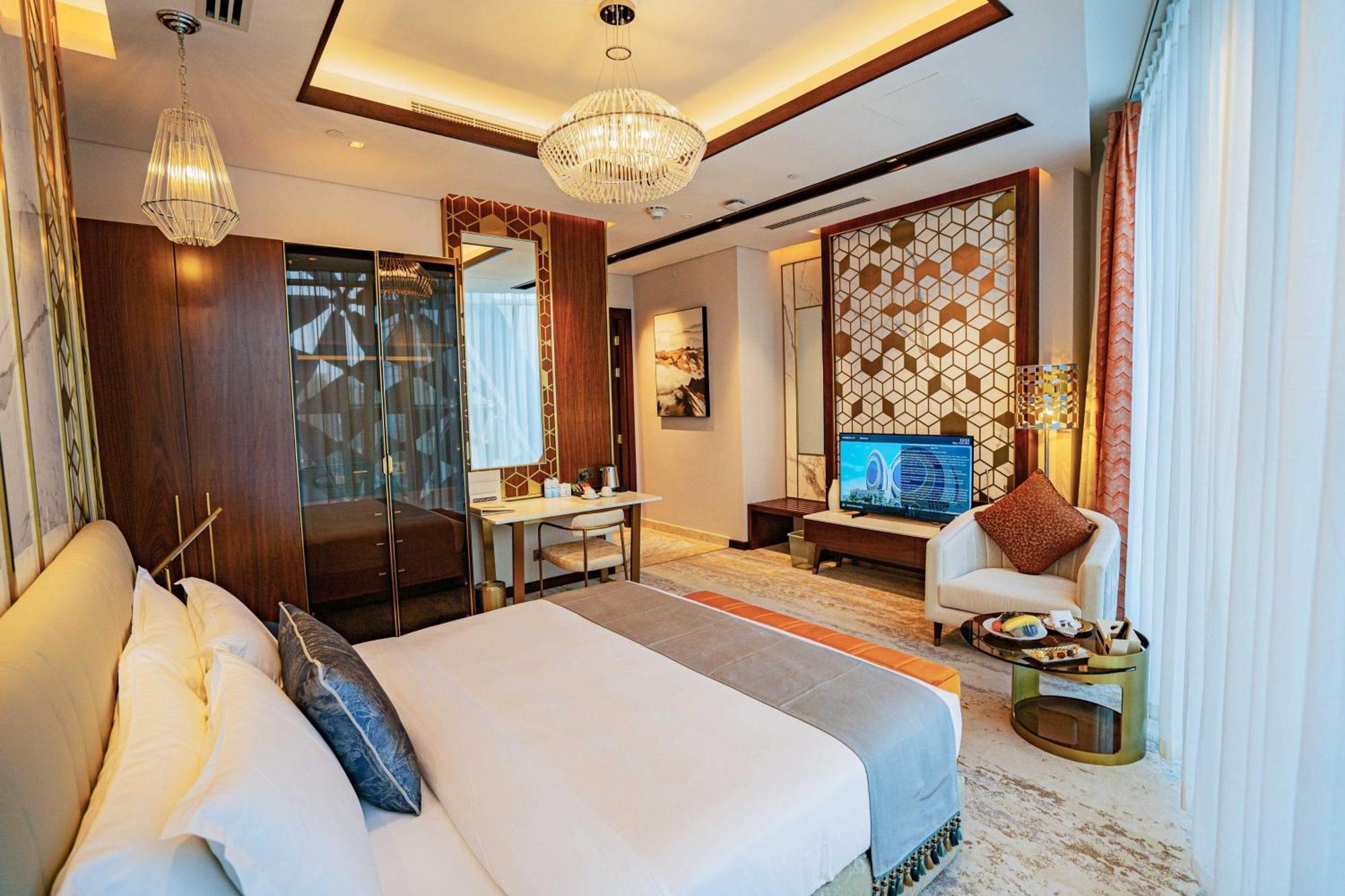 Velero Hotel Doha Lusail Kültér fotó A bedroom at the hotel